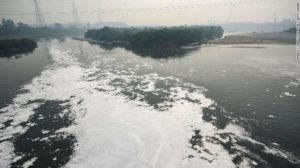 Toxic Foam Coats Sacred River In India