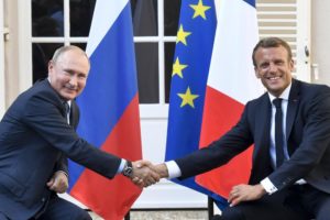 Putin Dividing NATO, Meets With Macron